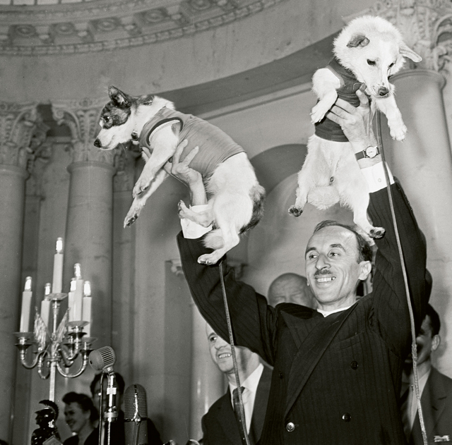1960_dr_oleg_gazenko_director_of_russia_s_institute_of_biomedical_problems_holding_belka_and_strelka_the_first_dogs_to_survive_spaceflight.jpg