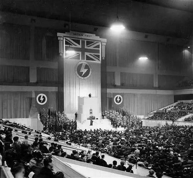 1939_british_fascist_sir_oswald_mosley_speaking_to_an_audience_of_30_000_at_earls_court_london_7_weeks_before_the_outbreak_of_ww2.jpg