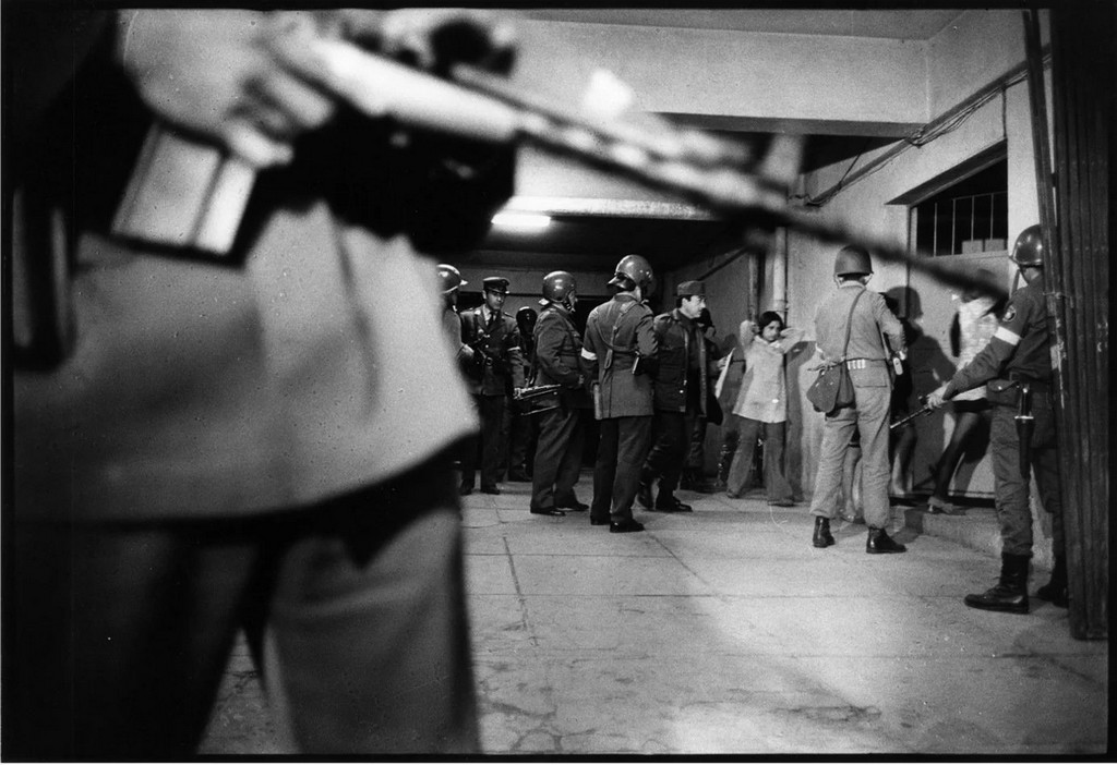 1973_political_prisoners_are_escorted_into_the_basement_of_the_national_stadium_following_augusto_pinochet_s_us-backed_coup_in_chile.jpg