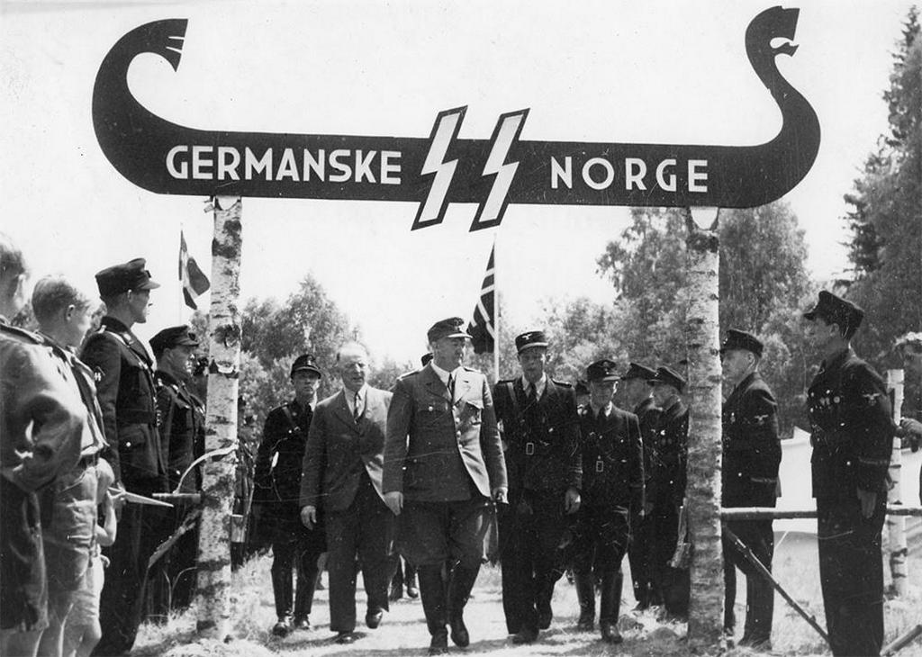 1941_norwegian_nazi_leader_vidkun_quisling_center_at_a_nazi_party_event_in_norway.jpg