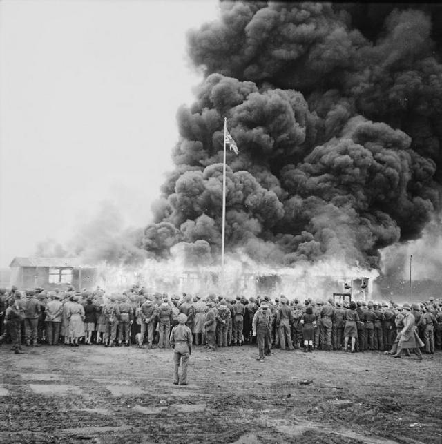 1945_british_troops_burning_bergan-belson_concentration_camp_after_its_liberation.jpg