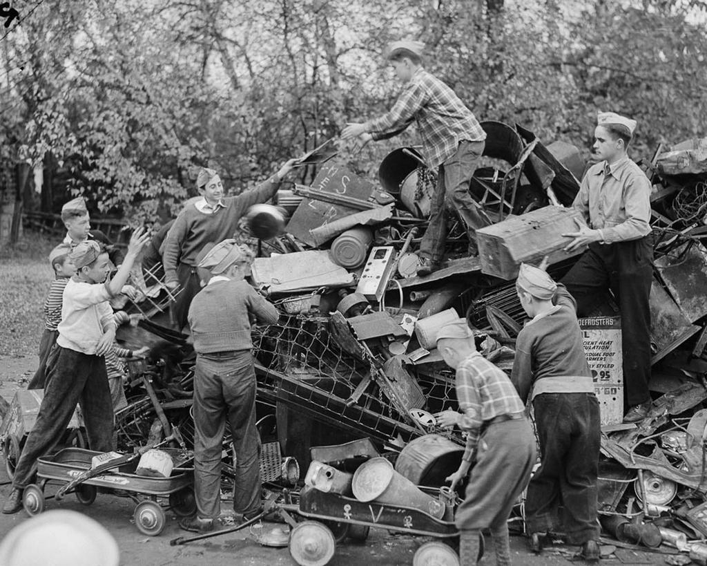 1943_us_boy_scouts_and_neighbors_collect_scrap_metal_for_the_war_effort.jpg