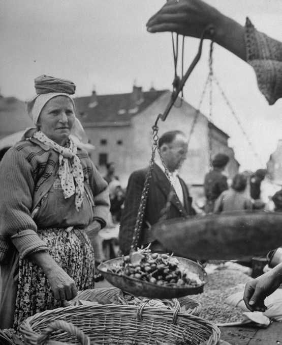 1948_a_woman_watching_as_the_cherries_are_being_weighed_at_the_market_zagreb_yugoslavia.jpg