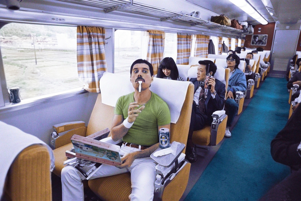 1982_freddie_mercury_on_a_bullet_train_shinkansen_leaving_for_nagoya_during_the_hot_space_japan_tour.jpg