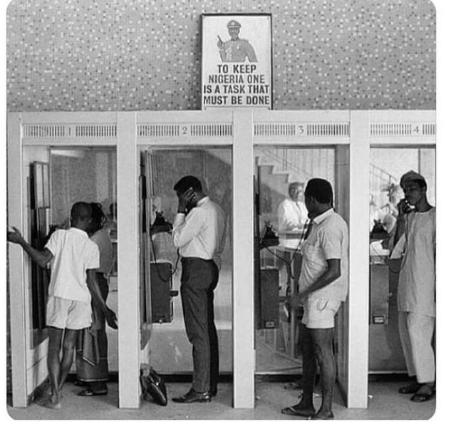 1969_phone_booths_in_lagos_nigeria_in_1969_during_the_biafra_war_nigerian_leader_yakubu_gowan_is_on_the_poster_above.jpg