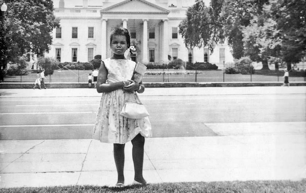 1964_10_yo_condoleezza_rice_standing_in_front_of_the_white_house_rice_would_go_on_to_serve_as_secretary_of_state_under_george_w_bush_the_first_african_american_woman_to_hold_the_position.jpg