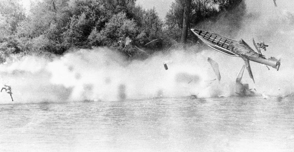 1966_hydroplane_driver_rene_andres_cartwheels_through_the_air_left_after_being_thrown_from_his_disintegrating_boat_on_the_feather_river_in_oroville_california.jpg