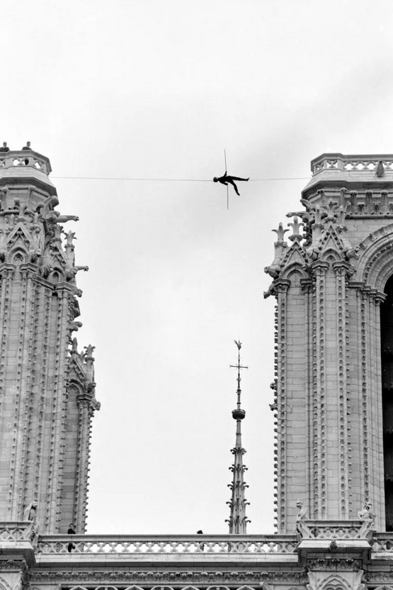 1971_wire-walker_phillipe_petit_lies_back_on_a_wire_strung_between_the_towers_of_the_notre_dame.png
