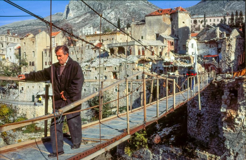 1994_old_bridge_of_mostar_in_the_midst_of_the_balkan_war.jpg