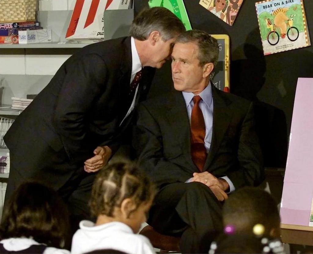 2001_chief_of_staff_andy_card_whispers_to_george_w_bush_of_the_plane_crashes_into_the_wtc_during_a_visit_to_the_emma_e_booker_elementary_school_in_sarasota.jpg