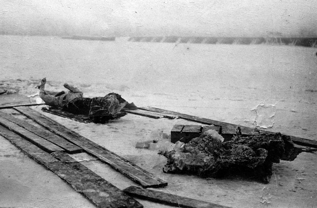 1916_a_post-mortem_photograph_of_grigori_rasputin_taken_after_the_discovery_of_his_body_l_in_the_frozen_malaya_nevka_river_in_st_petersburg.jpg