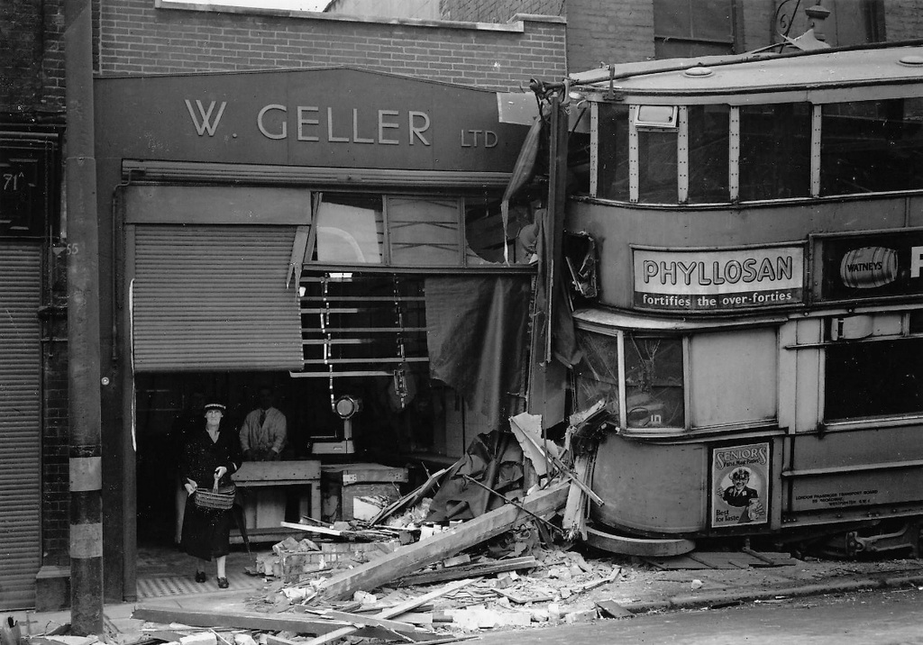 1946_london_transport_e1_tram_576_jumped_the_rails_on_woolwich_new_road_and_crashed_into_butcher_shop_some_passengers_suffered_minor_injuries.jpg