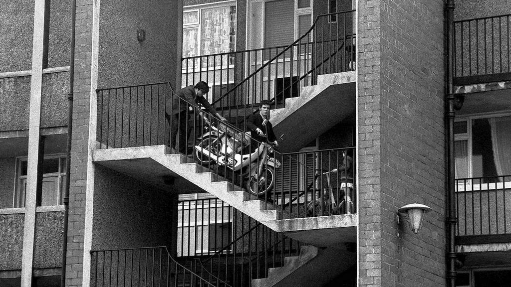 1969_bringing_a_honda_c50_down_the_stairs_dublin.jpg