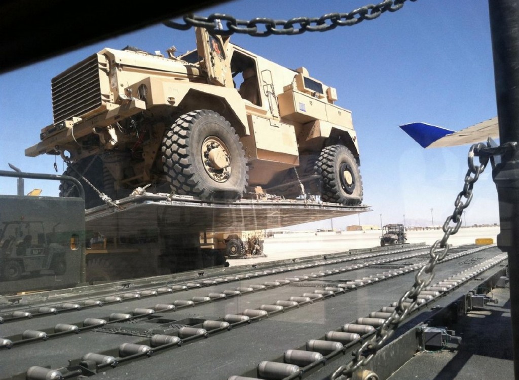 2013_mrap_being_loaded_onto_national_airlines_flight_102_cr.jpg