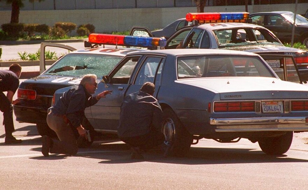 1997_lapd_officers_take_cover_behind_a_car_during_the_1997_north_hollywood_shootout.jpg