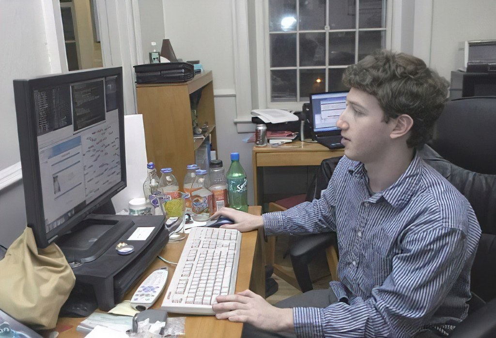 2004_mark_e_zuckerberg_working_on_a_pc_in_his_dorm_room_in_kirkland_house_at_harvard_university.jpg