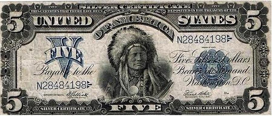 1899. Az egyetlen dollárbankjegy, amelyen őslakos képe szerepel. A római ötös a felirattal a GTA V játék logójában is szerepel..jpg