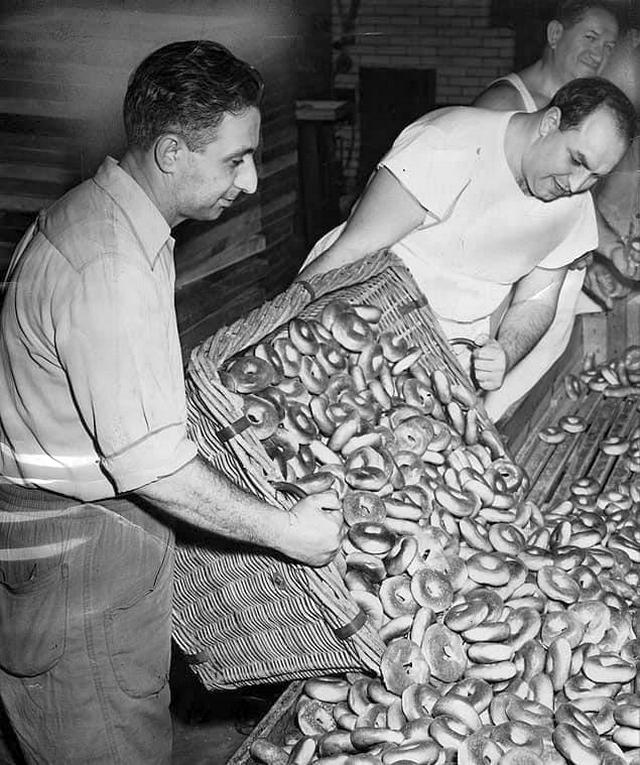 1954_east_new_york_brooklyn_back_in_business_after_bagel_bakers_strike_hy_masel_and_barney_goldstein_turn_out_fresh_bagels_at_the_east_new_york_sanitary_bagel_corp.jpg