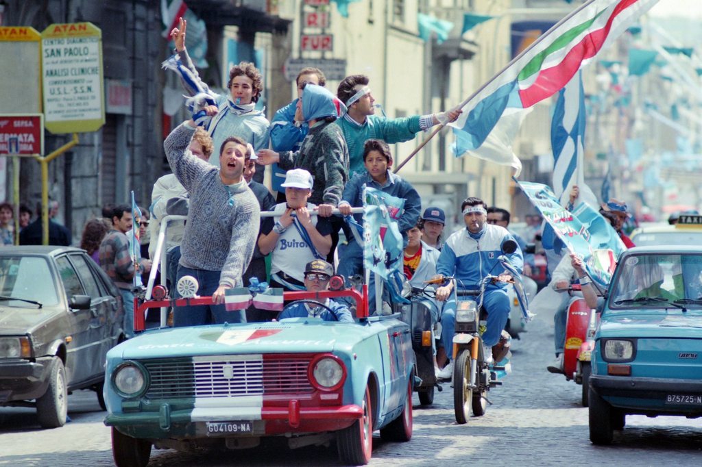 1987_supporters_of_s_s_c_napoli_celebrate_the_first_scudetto_won_by_the_football_team.jpg