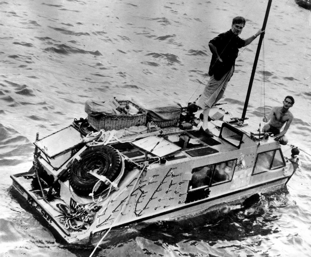 1956_ben_carlin_and_barry_hanley_on_their_amphibious_jeep_in_the_port_of_hong_kong_ben_carlin_has_been_the_first_and_only_person_to_circumnavigate_the_world_in_an_amphibious_vehicle.jpg