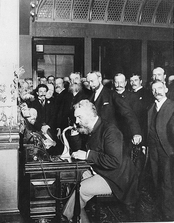 1892_alexander_graham_bell_at_the_opening_of_the_long-distance_telephone_line_from_new_york_city_to_chicago.jpg
