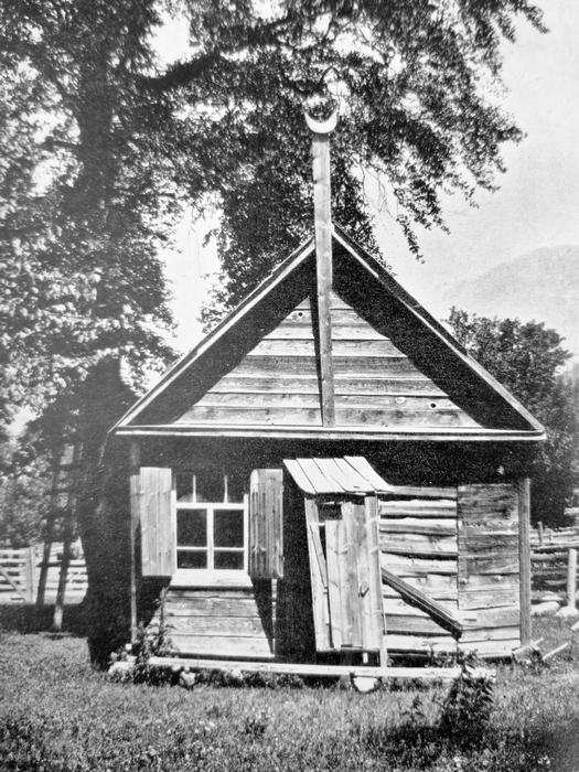 1929_a_wooden_mosque_in_teberda_with_a_ladder_up_a_tree_for_muezzin_to_climb_to_call_for_prayer.jpg