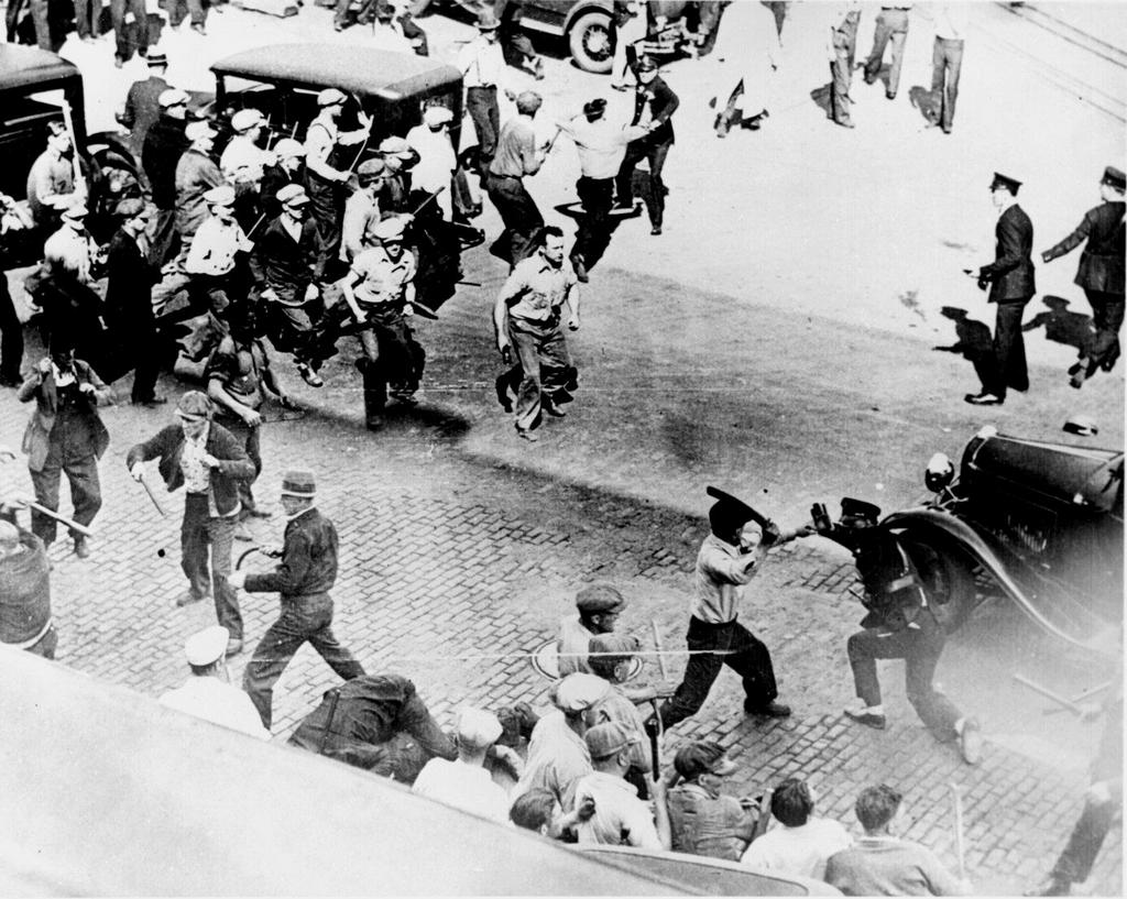 1934_battle_between_striking_teamsters_armed_with_pipes_and_the_police_in_the_streets_of_minneapolis.jpg