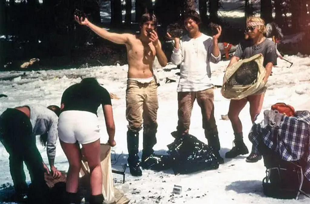 1977_a_group_of_hippies_recovering_bags_of_marijuana_from_the_frozen_lower_merced_pass_lake_in_yosemite_national_park_which_fell_from_a_crashed_smuggler_s_plane.png