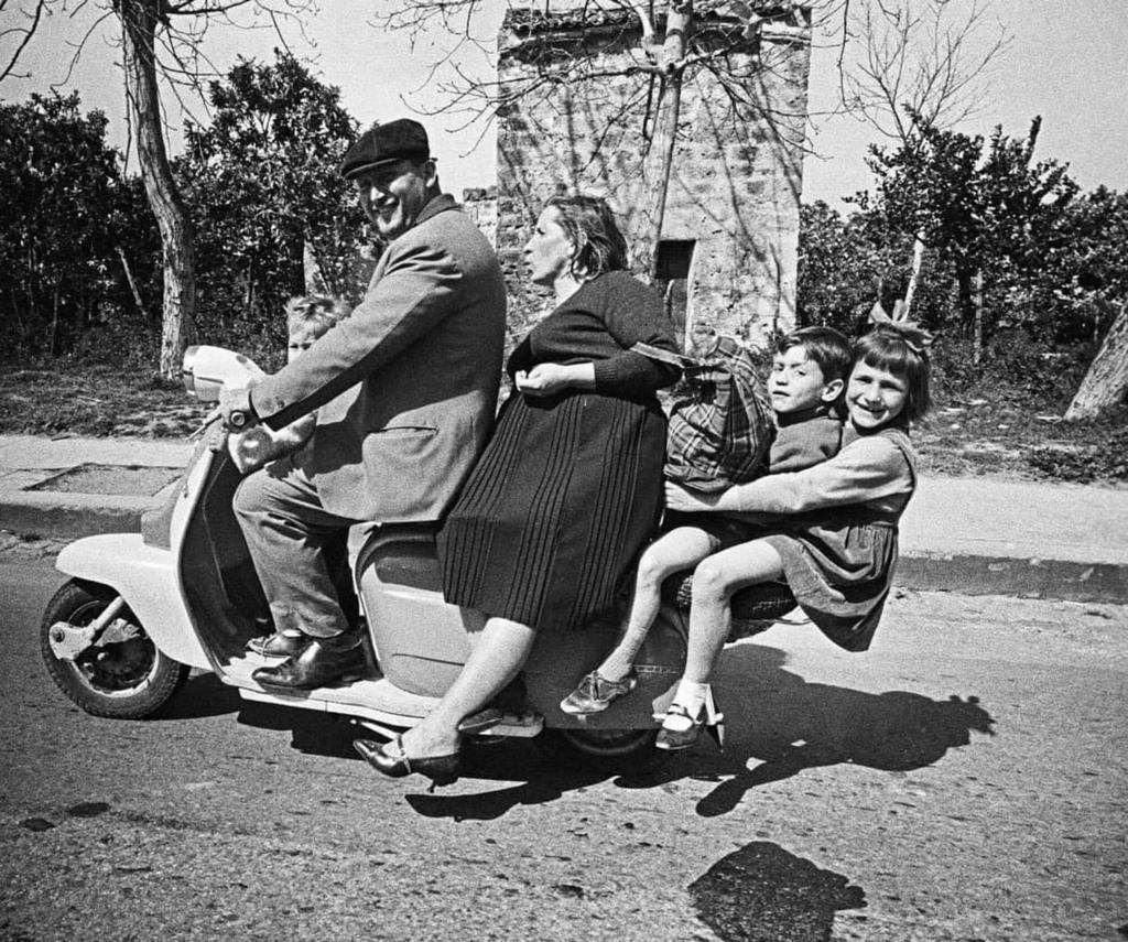 1963_italian_family_riding_a_lambretta_scooter_in_sicily.jpg