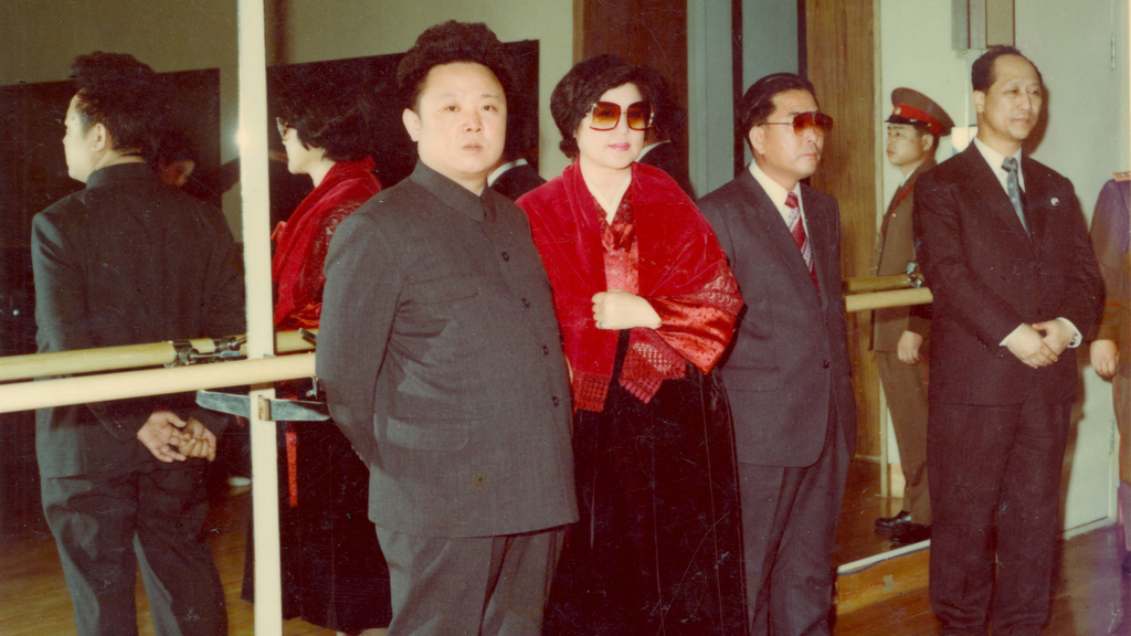 1982_korul_kim_jong_il_with_famous_south_korean_actress_choi_eun-hee_and_her_husband_director_shin_jeong-gyun_who_were_kidnapped_in_1978_on_his_orders_and_were_forced_to_make_north_korean_films.jpg