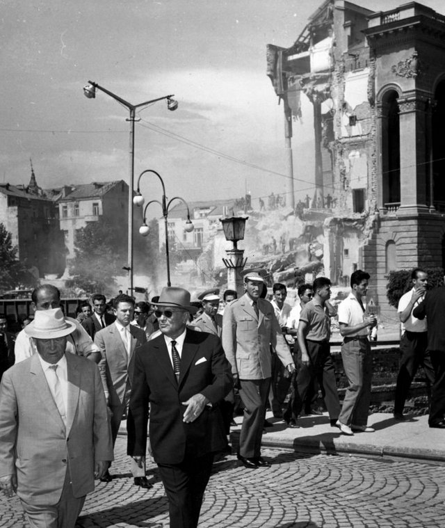 1963_soviet_premier_nikita_khrushchev_and_yugoslavian_president_josip_broz_tito_in_front_of_the_shattered_army_club_in_skopje_yugoslavia_during_their_visit_to_survey_the_damage_caused_by_an_earthquake.jpg