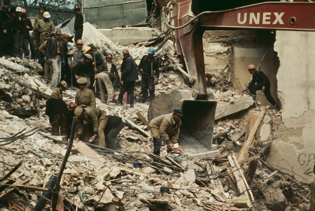 1977_rescue_workers_sifting_through_rubble_in_bucharest_following_a_powerful_earthquake.jpg