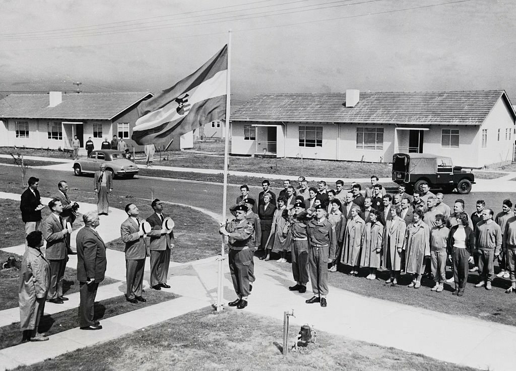 1956_the_flag_of_free_hungary_is_raised_by_an_australian_honor_guard_at_olympic_village_melbourne_aus.jpg