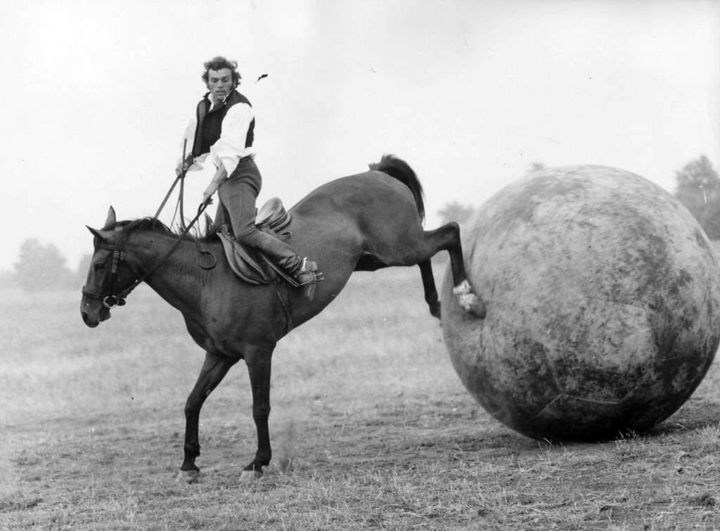 1976_a_rider_gets_his_horse_to_kick_a_giant_football_during_an_equestrian_football_match_apajpuszta.jpg
