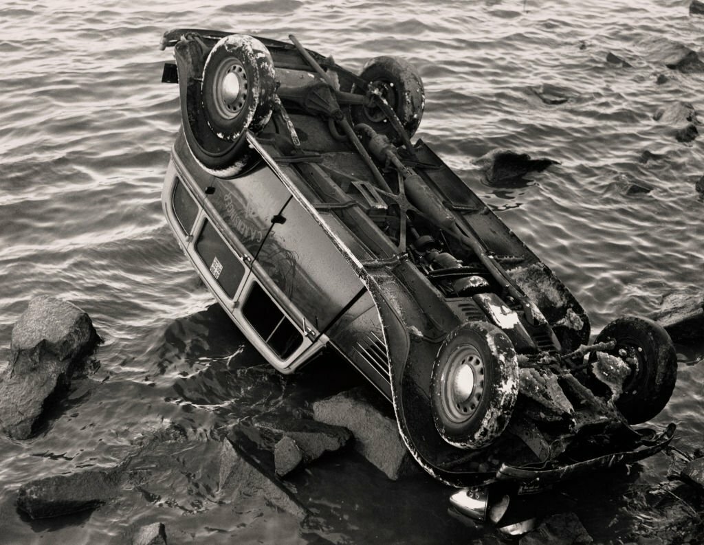 1937_overturned_taxi_sits_in_the_potomac_river_in_washington_dc_police_are_investigating_the_possibility_that_the_vehicle_was_stolen_damaged_and_abandoned_by_gangsters.jpg