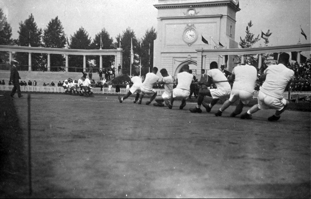 1920_two_teams_competing_in_the_tug_of_war_event_during_the_1920_summer_olympics_antwerp_belgium.jpeg