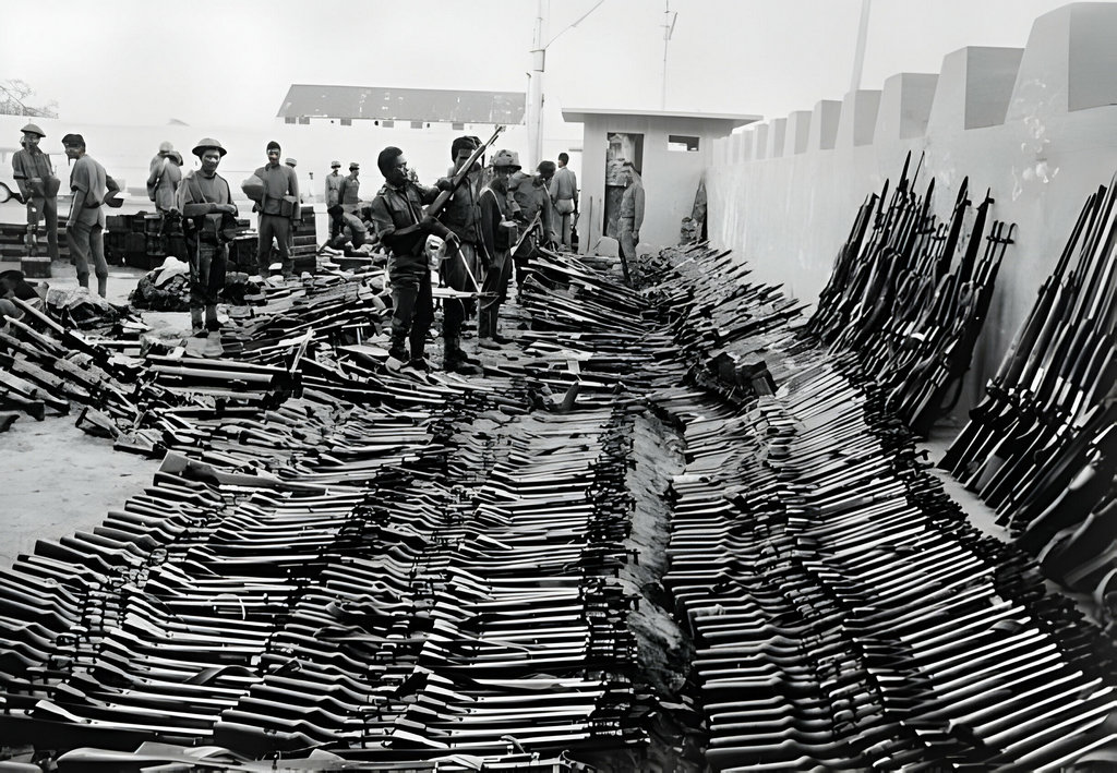 1971_indian_army_officers_examine_a_pile_of_rifles_taken_from_surrendered_pakistani_troops_in_the_military_action_that_separated_east_pakistan_from_west_pakistan_and_created_the_state_of_bangladesh.jpg