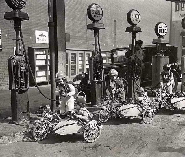1931_young_riders_refuel_during_a_children_s_sidecar_race_in_berlin_germany.jpeg
