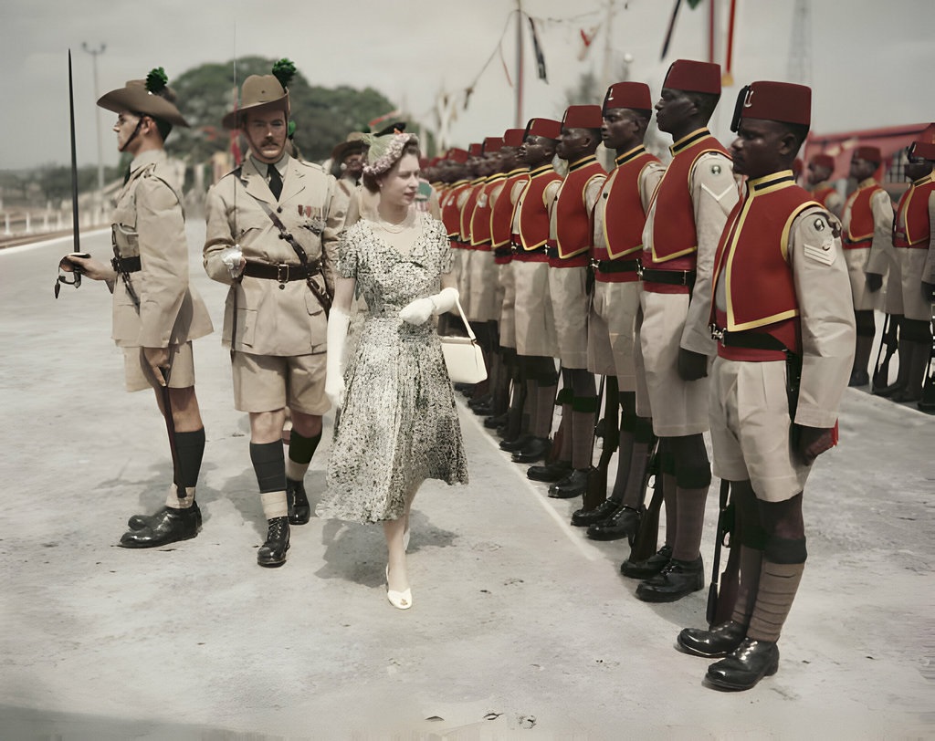 1956_queen_elizabeth_ii_inspects_men_of_the_newly-renamed_queen_s_own_nigeria_regiment_royal_west_african_frontier_force_at_kaduna_airport_nigeria_during_her_commonwealth_tour.jpg