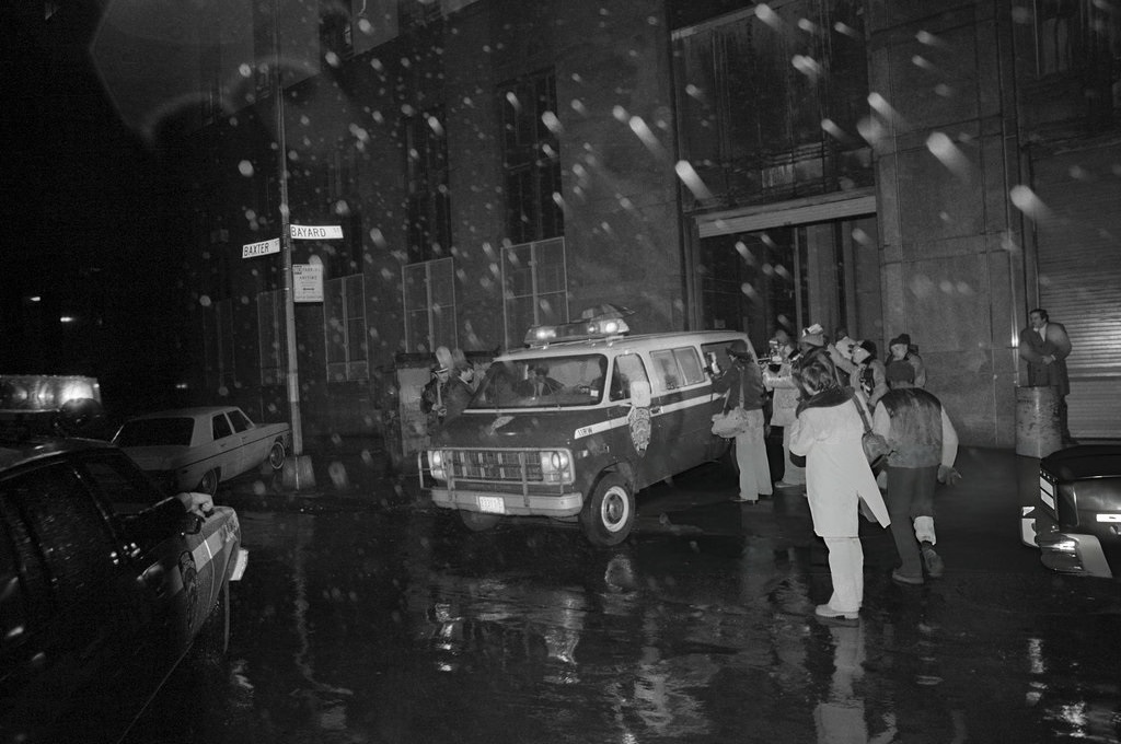 1980_a_police_van_with_mark_david_chapman_inside_leaves_manhattan_criminal_court.jpg