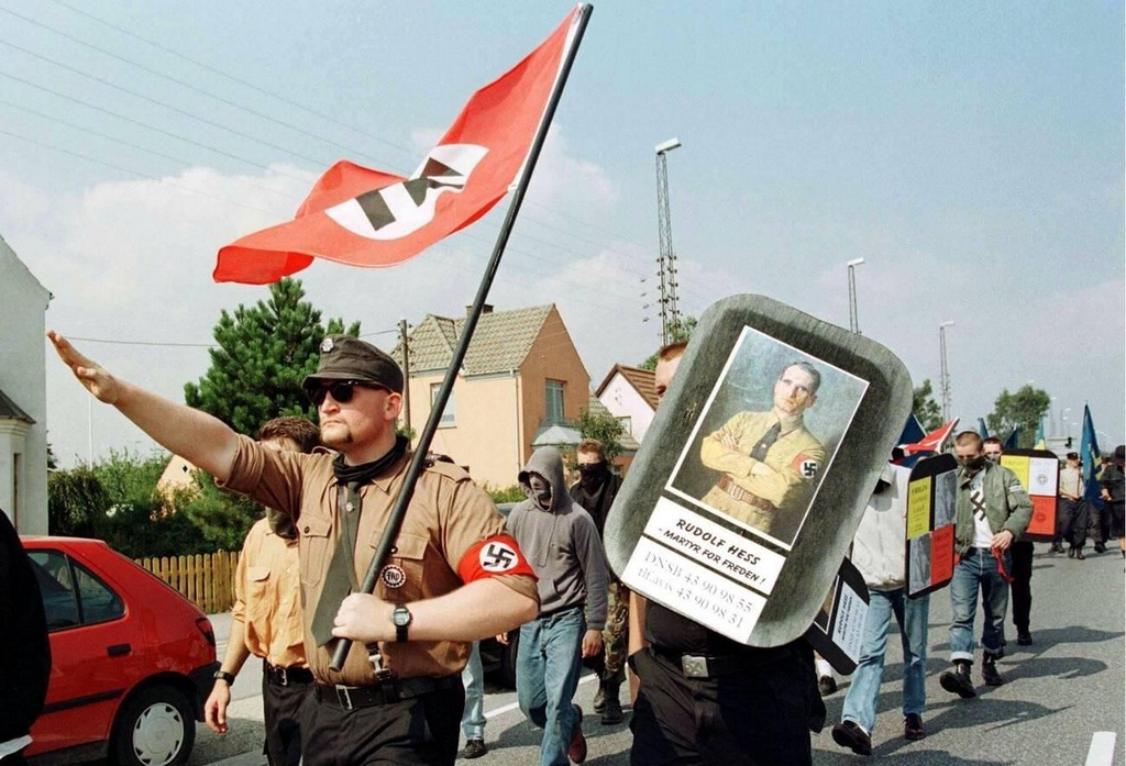 1997_saluting_german_neo-nazis_members_of_the_outlawed_german_freedom_workers_party_marching_through_the_town_of_koege_west_of_copenhagen.jpg