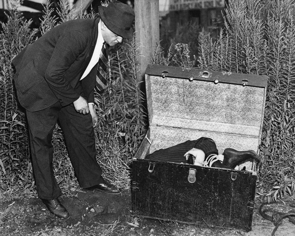 1936_the_corpse_of_murdered_gangster_william_hessler_was_tied_together_and_stuffed_in_a_suitcase.jpg