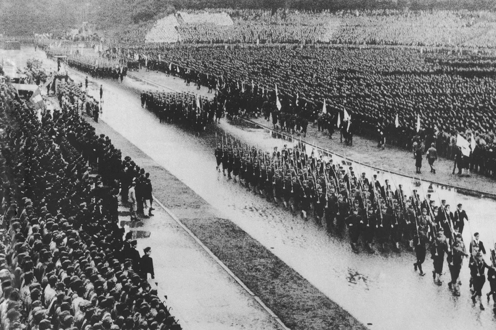 1943_student_conscripts_from_aoyama_gakuin_university_marching_at_their_farewell_ceremony_before_going_to_war_tokyo_japan.jpg