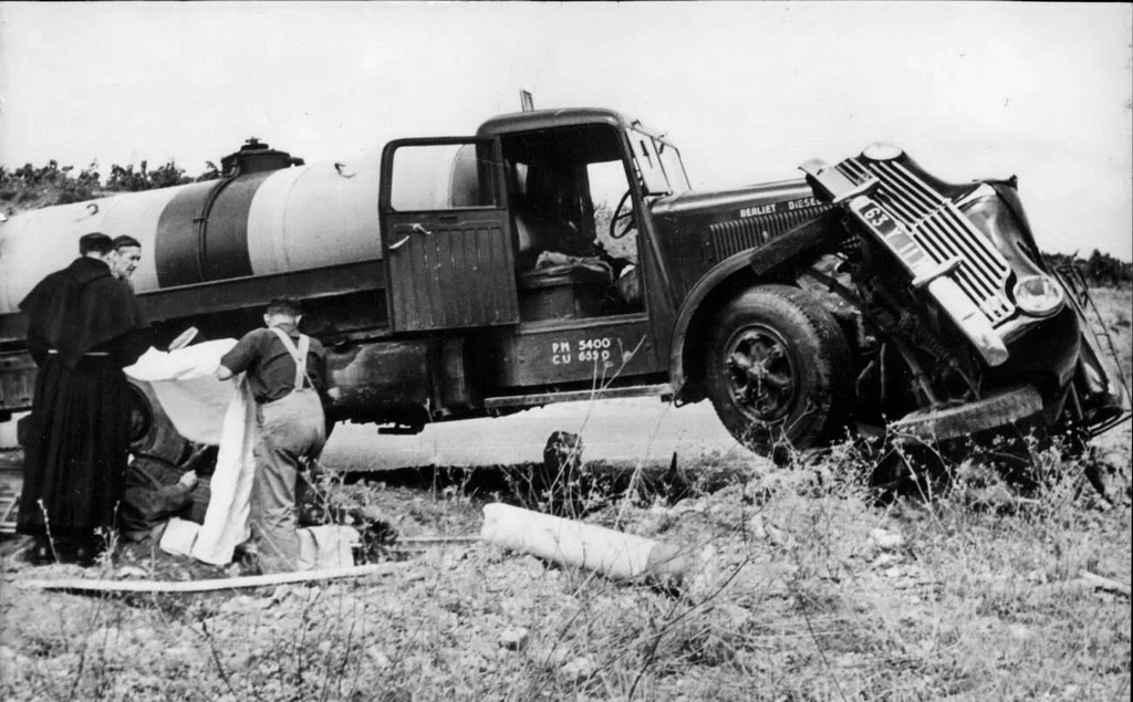 1953_the_priest_was_there_a_french_priest_giving_the_last_sacrement_to_a_victim_of_a_road_accident_near_lezignan_south_eastern_france_cr.jpg