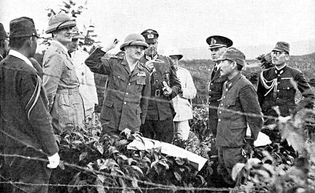 1942_a_delegation_of_military_attaches_from_finland_romania_italy_and_germany_during_a_visit_to_japanese_occupied_dutch_east_indies.png