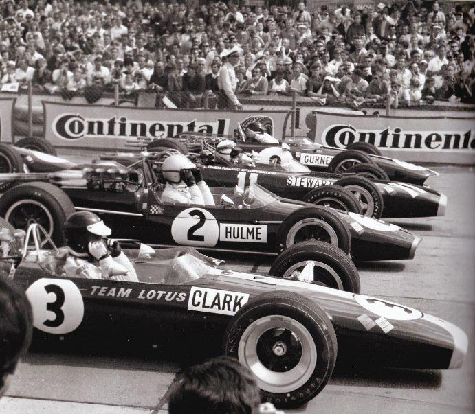 1967. Jim Clark, Denny Hulme, Jackie Stewart and Dan Gurney a Nürburgringen..jpg