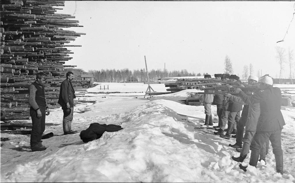 1918_white_army_soldiers_executing_two_red_guard_members_in_varkaus_during_the_finnish_civil_war.jpeg