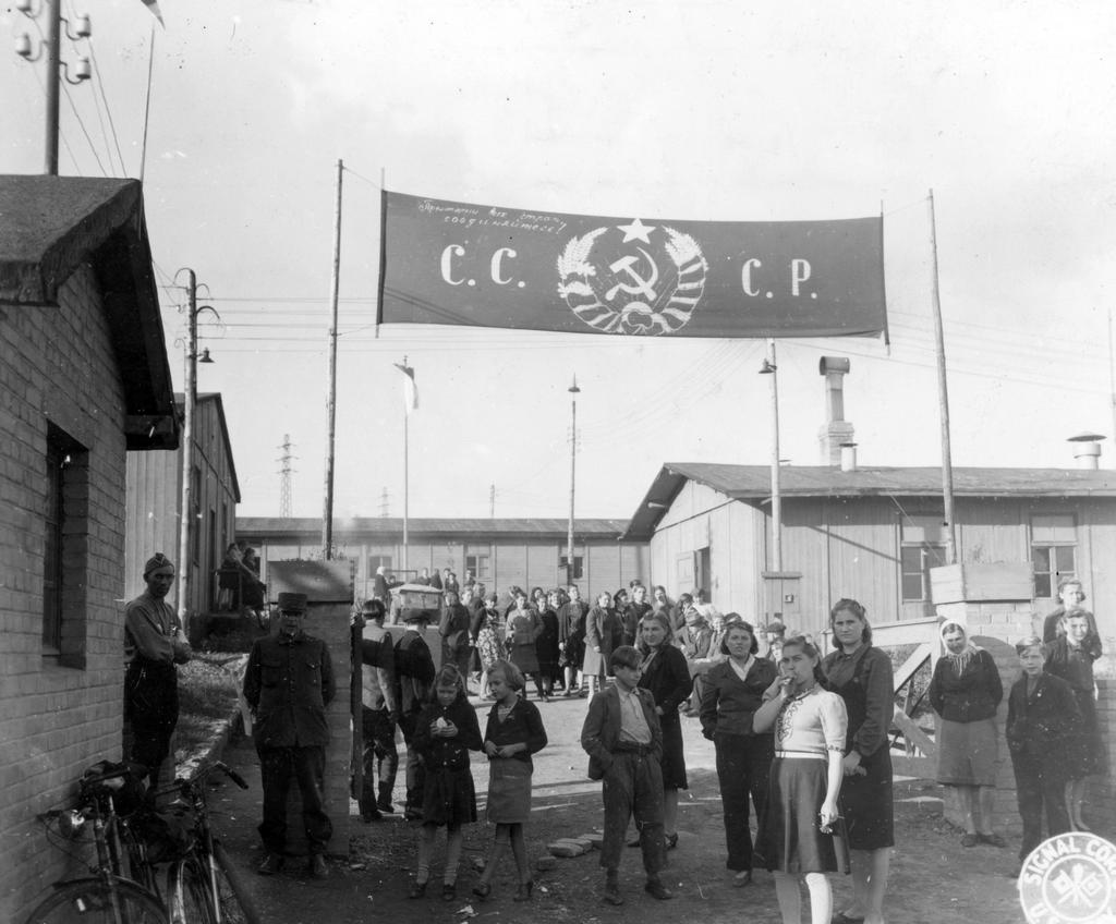 1944_oktober_the_entrance_to_a_refugee_camp_in_luxembourg_for_former_russian_forced_laborers.jpeg