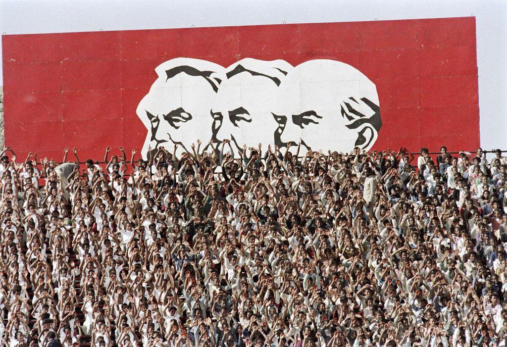 1987_supporters_of_the_ethiopian_workers_party_wave_in_front_of_portraits_of_marx_engels_and_lenin_in_addis_ababa.jpeg