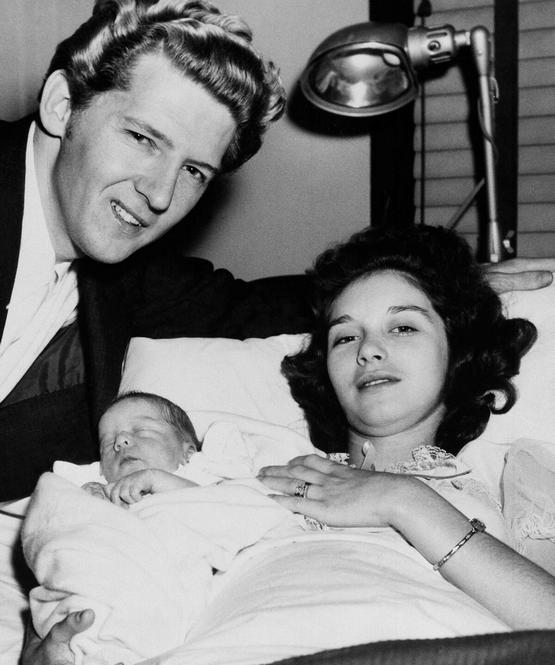 1959_rock_roll_singer_jerry_lee_lewis_and_his_14-year-old_wife_myra_lewis_are_posing_with_their_firstborn.jpg